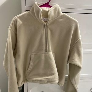 Aritzia TNA cropped oatmeal colored half zip